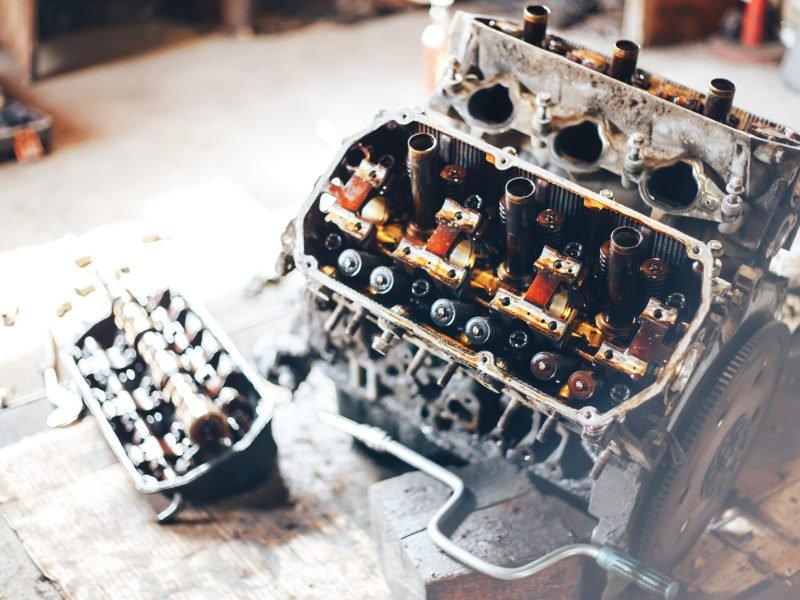 colorful car engine part standing in garage